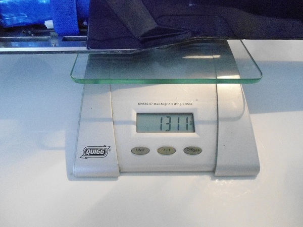 Het totaalgewicht is 1311 gram. 1162 gram is het minimale wedstrijdgewicht voor dit type auto`s.